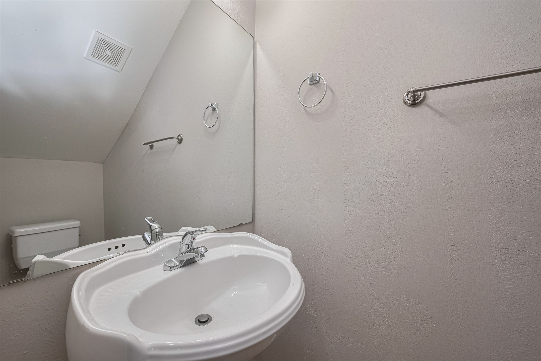 15210 Addicks Stone Drive, Unit B Houston, TX 77082 - Photo 13 of 31 a bathroom with a sink and mirror