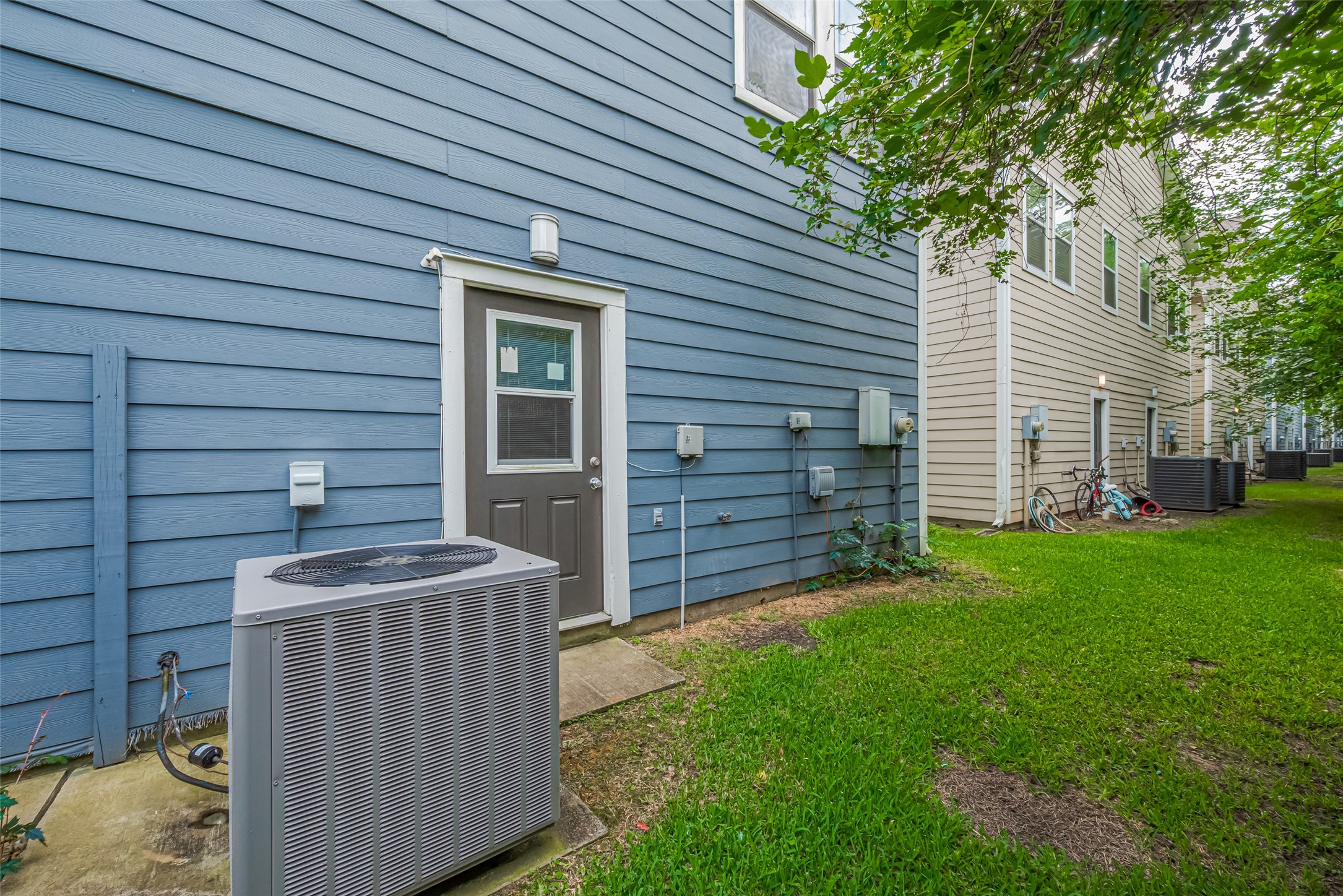 15210 Addicks Stone Drive, Unit B Houston, TX 77082 - Photo 29 of 31 a front view of a house with a garden