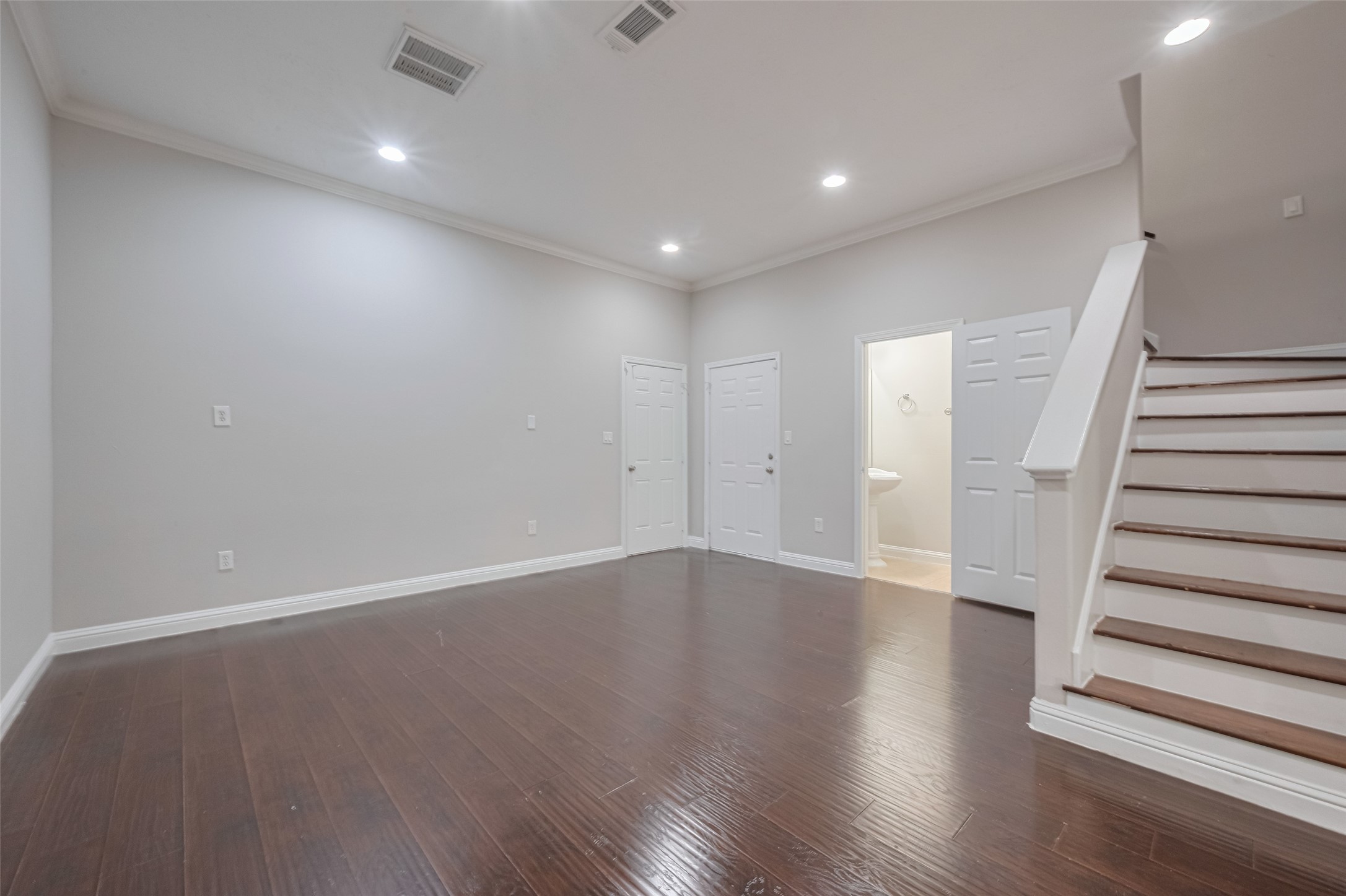15210 Addicks Stone Drive, Unit B Houston, TX 77082 - Photo 3 of 31 an empty room with wooden floor and entryway