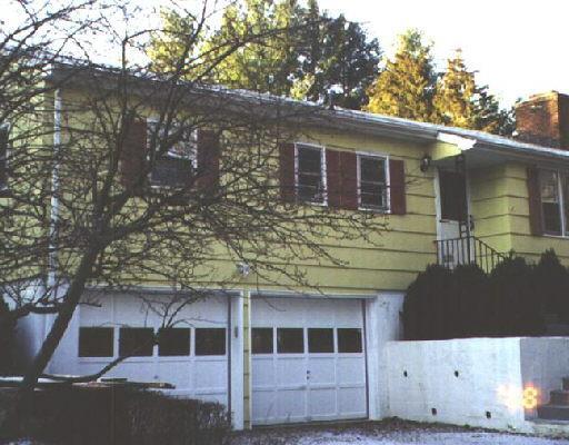 62 Great Hill Road Ridgefield, CT 06877 - Photo 1 of 1 a front view of a house with a yard