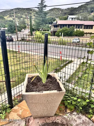 a view of a balcony with a lake view