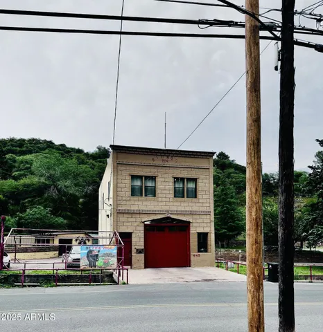 a view of a house with a street