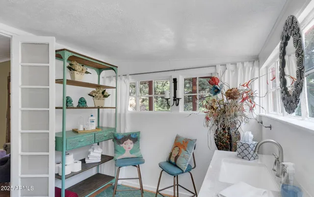 a living room with furniture and decor