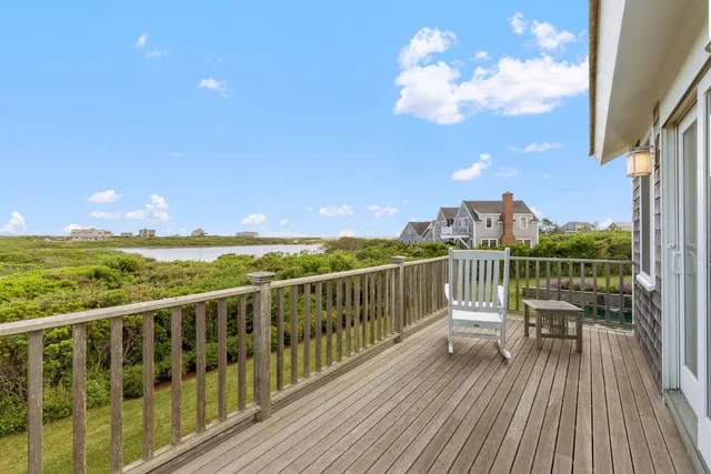 a bathroom with a granite countertop sink mirror and double