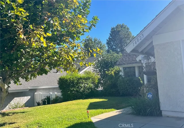 a view of a backyard with a garden