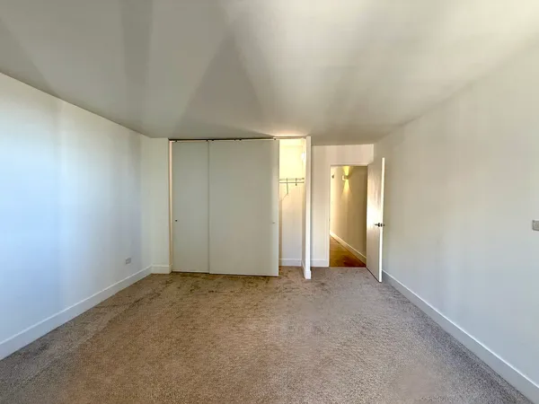 an empty room with an entryway
