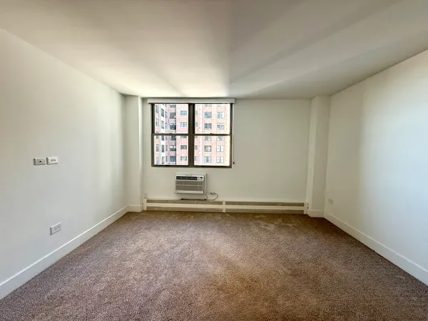 an empty room with a window