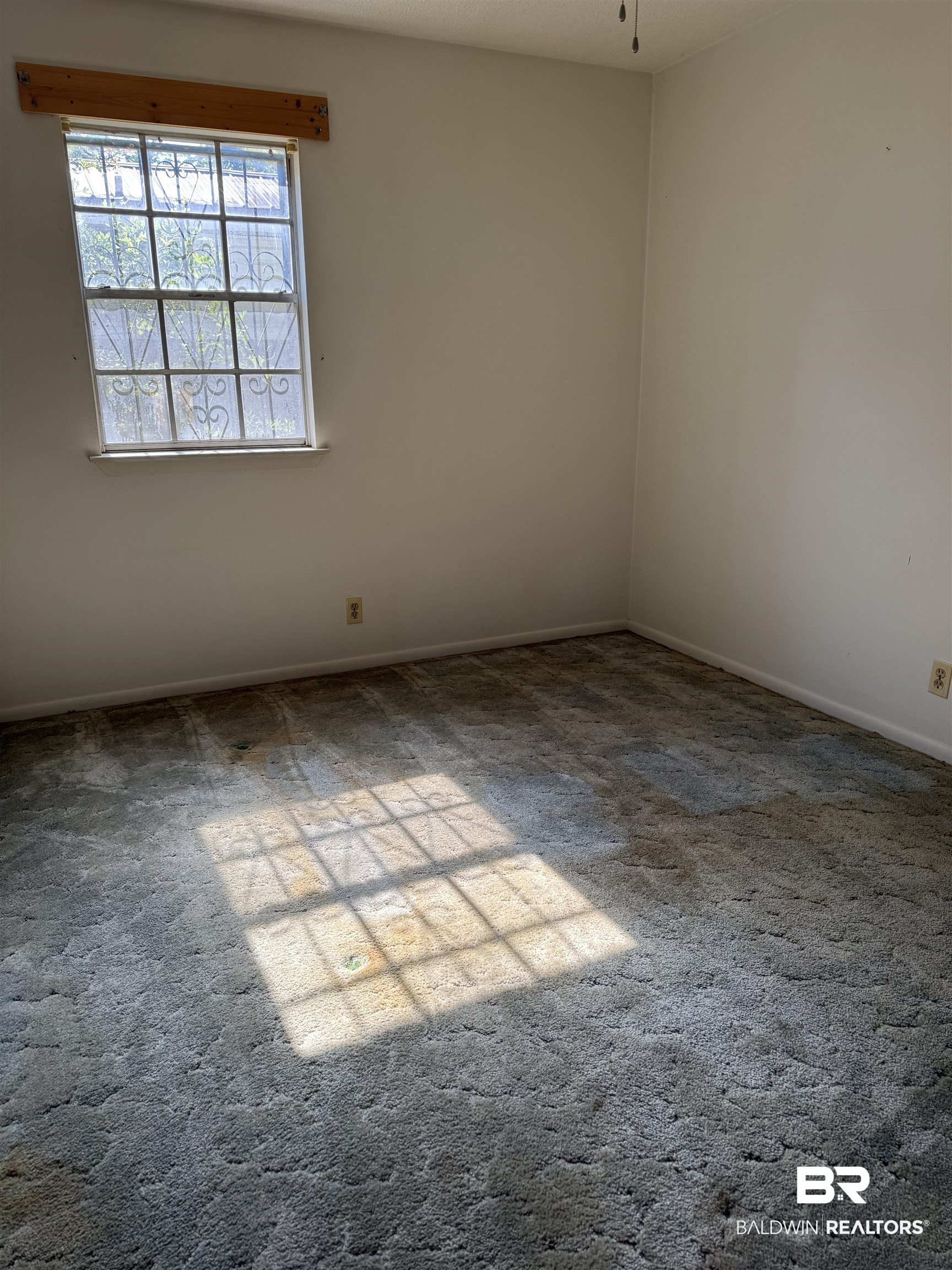607 West Lee Street Mobile, AL 36611 - Photo 11 of 11 Carpeted empty room with baseboards