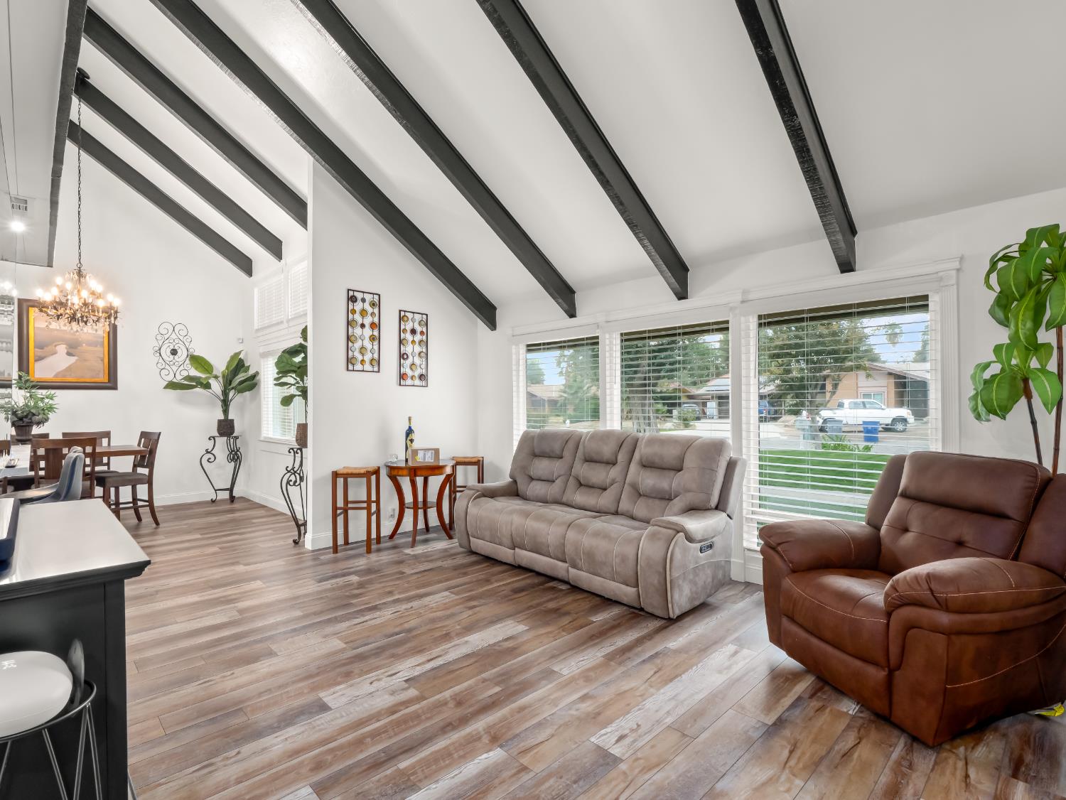 1691 South Bailey Avenue Fresno, CA 93727 - Photo 13 of 41 a living room with furniture and a large window