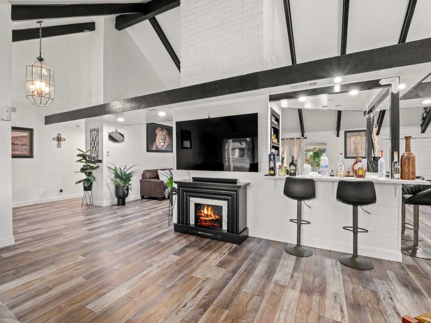 1691 South Bailey Avenue Fresno, CA 93727 - Photo 14 of 41 a living room with furniture and a wooden floor