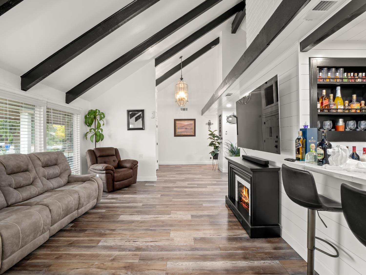 1691 South Bailey Avenue Fresno, CA 93727 - Photo 15 of 41 a living room with furniture and a flat screen tv