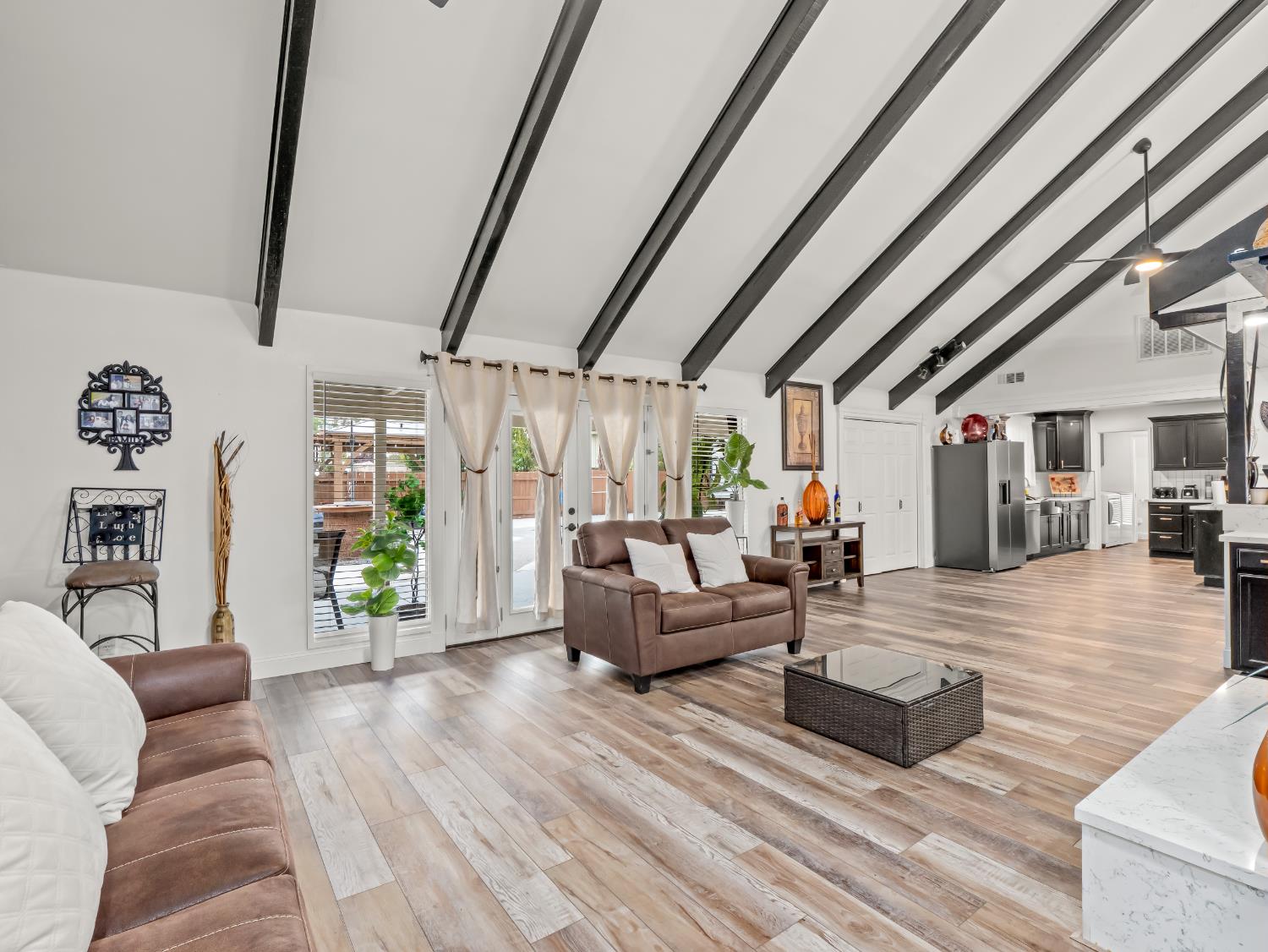 1691 South Bailey Avenue Fresno, CA 93727 - Photo 16 of 41 a living room with furniture and wooden floor