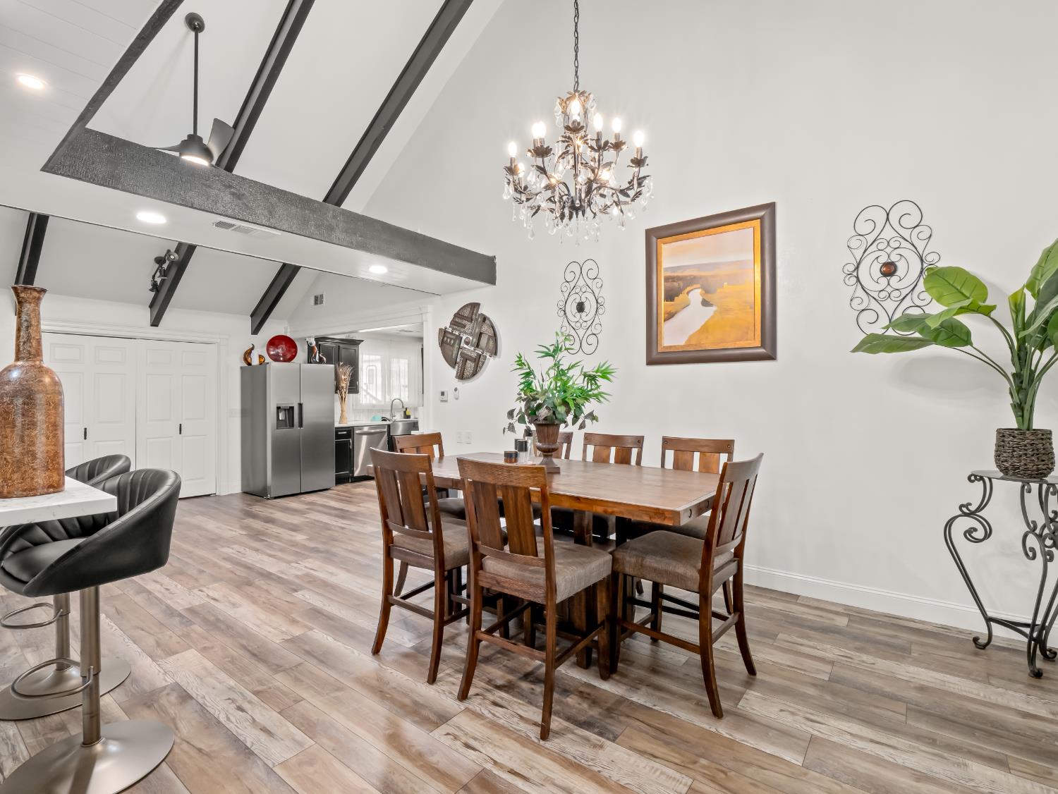 1691 South Bailey Avenue Fresno, CA 93727 - Photo 17 of 41 a view of a dining room with furniture and chandelier
