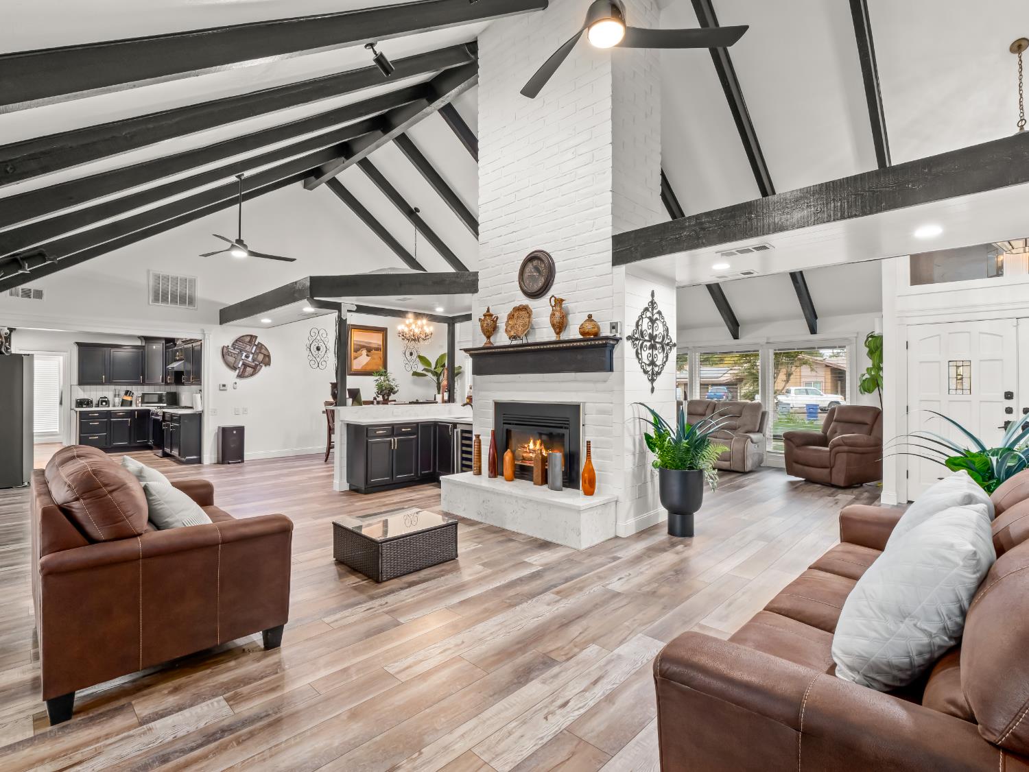 1691 South Bailey Avenue Fresno, CA 93727 - Photo 18 of 41 a living room with furniture and a fireplace