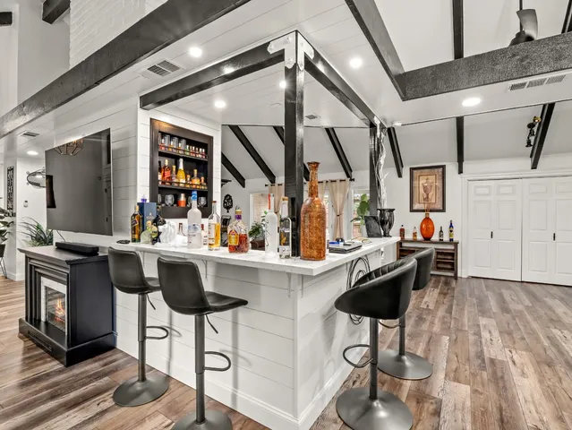 a kitchen with a sink and a refrigerator