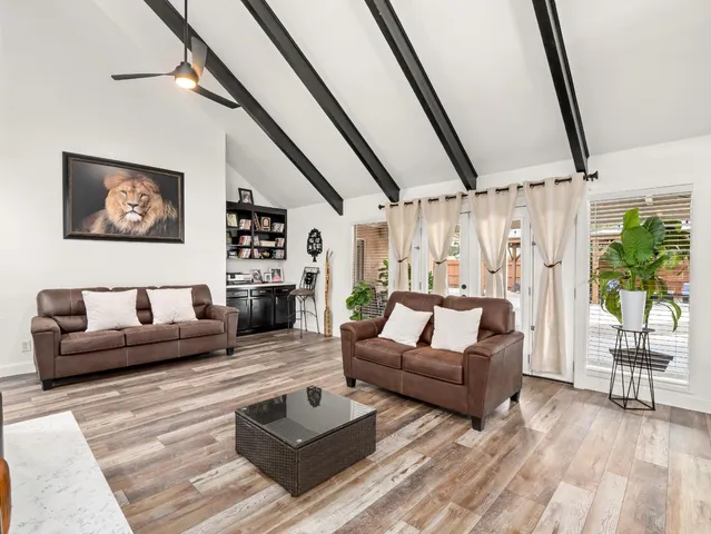 a bed room with a bed and furniture