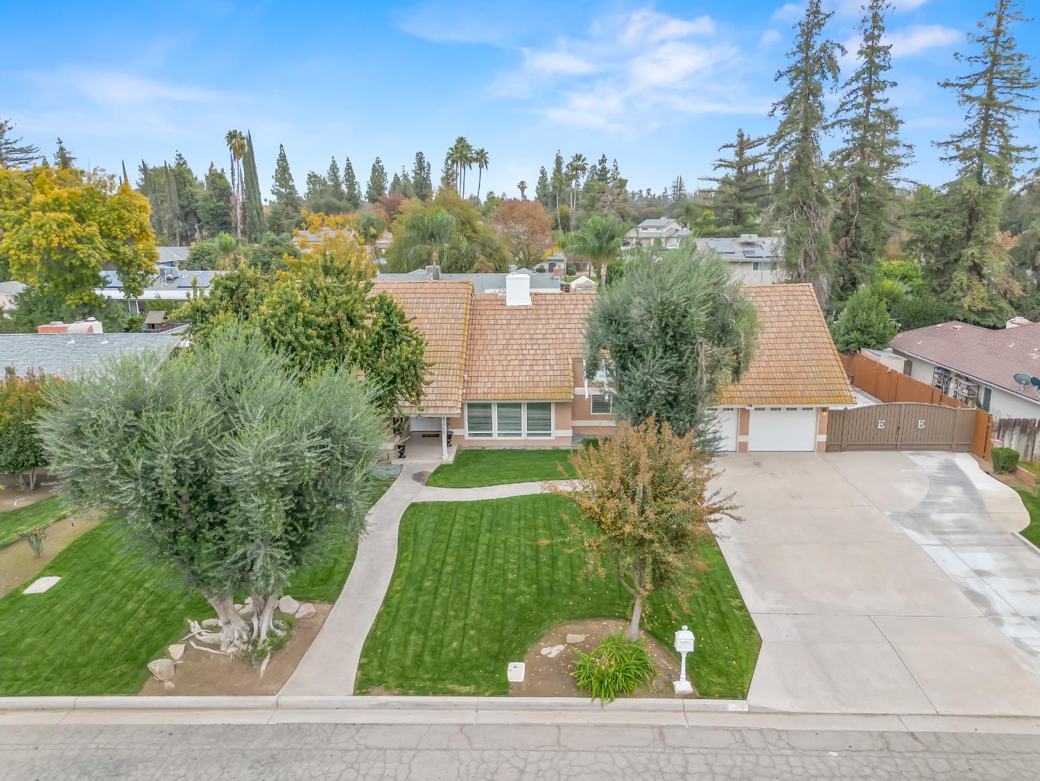 1691 South Bailey Avenue Fresno, CA 93727 - Photo 3 of 41 an aerial view of a house