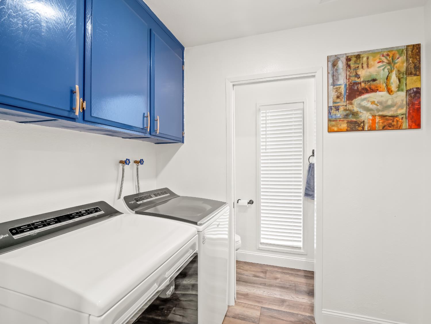 1691 South Bailey Avenue Fresno, CA 93727 - Photo 34 of 41 a utility room with dryer and washer
