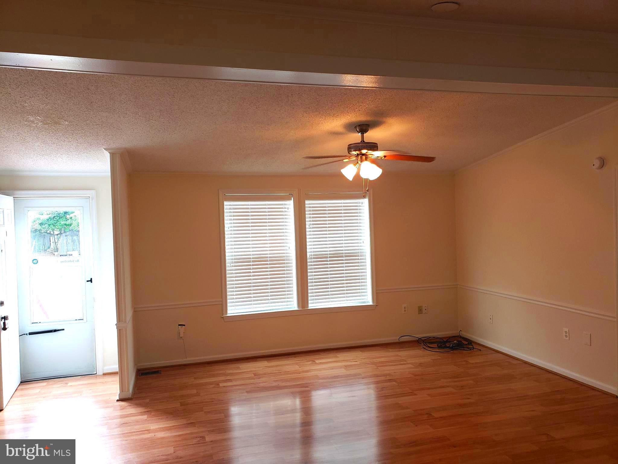 45886 South Springsteen Court California, MD 20619 - Photo 18 of 30 Living room is open to kitchen.