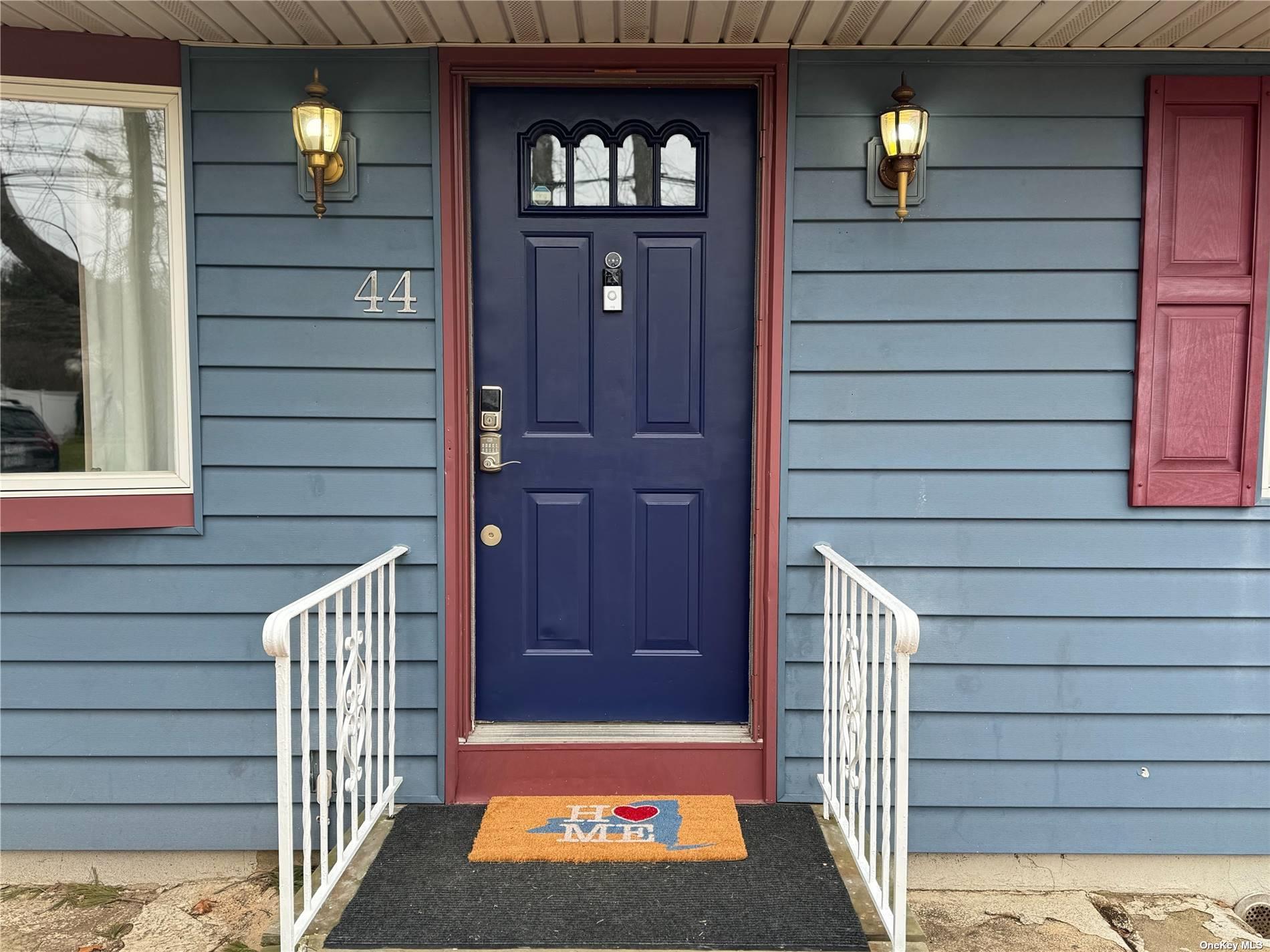 a view of an entryway door front of house
