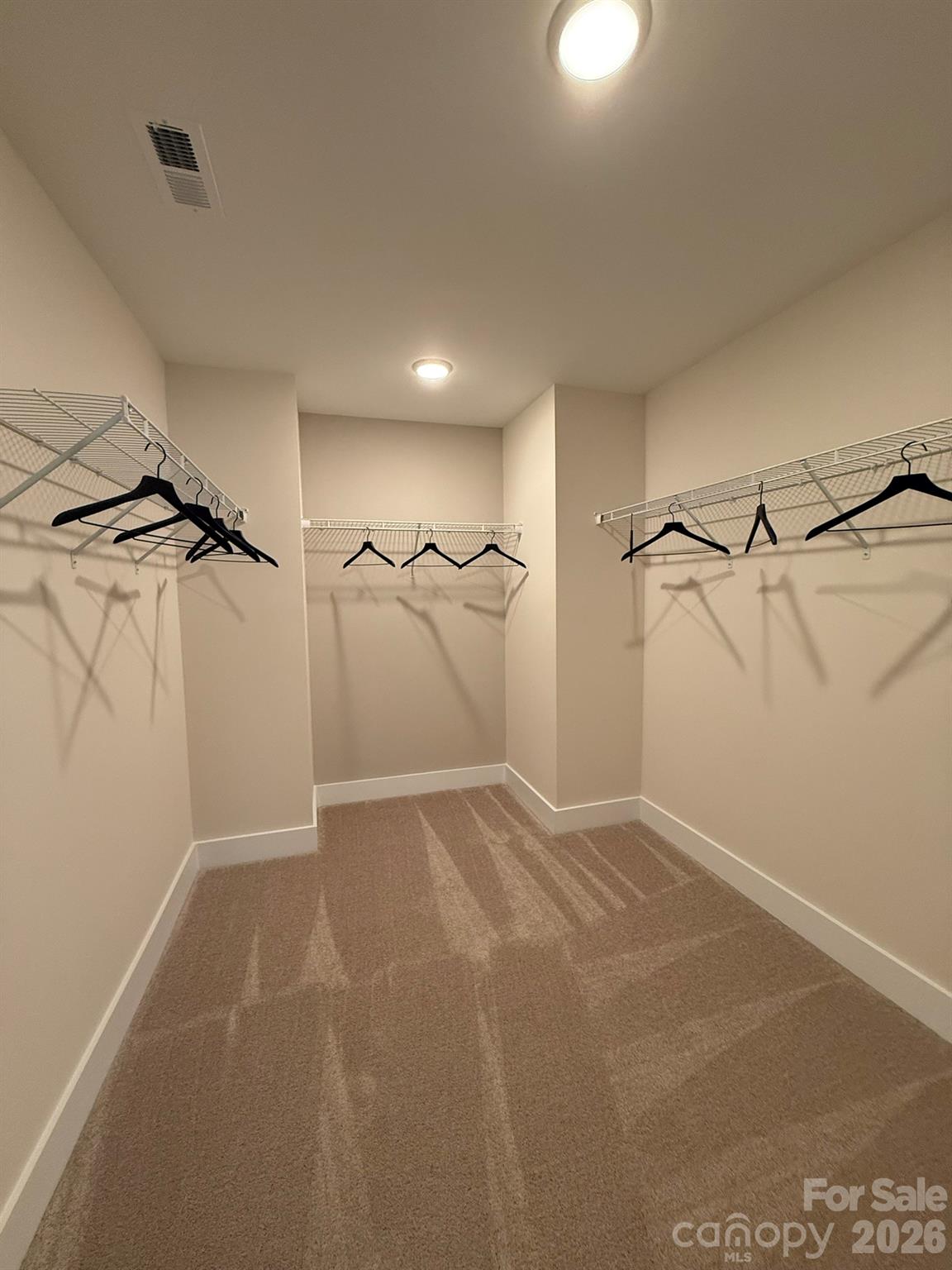 5104 Verona Road Charlotte, NC 28213 - Photo 20 of 28 a view of a room with racks on the wall