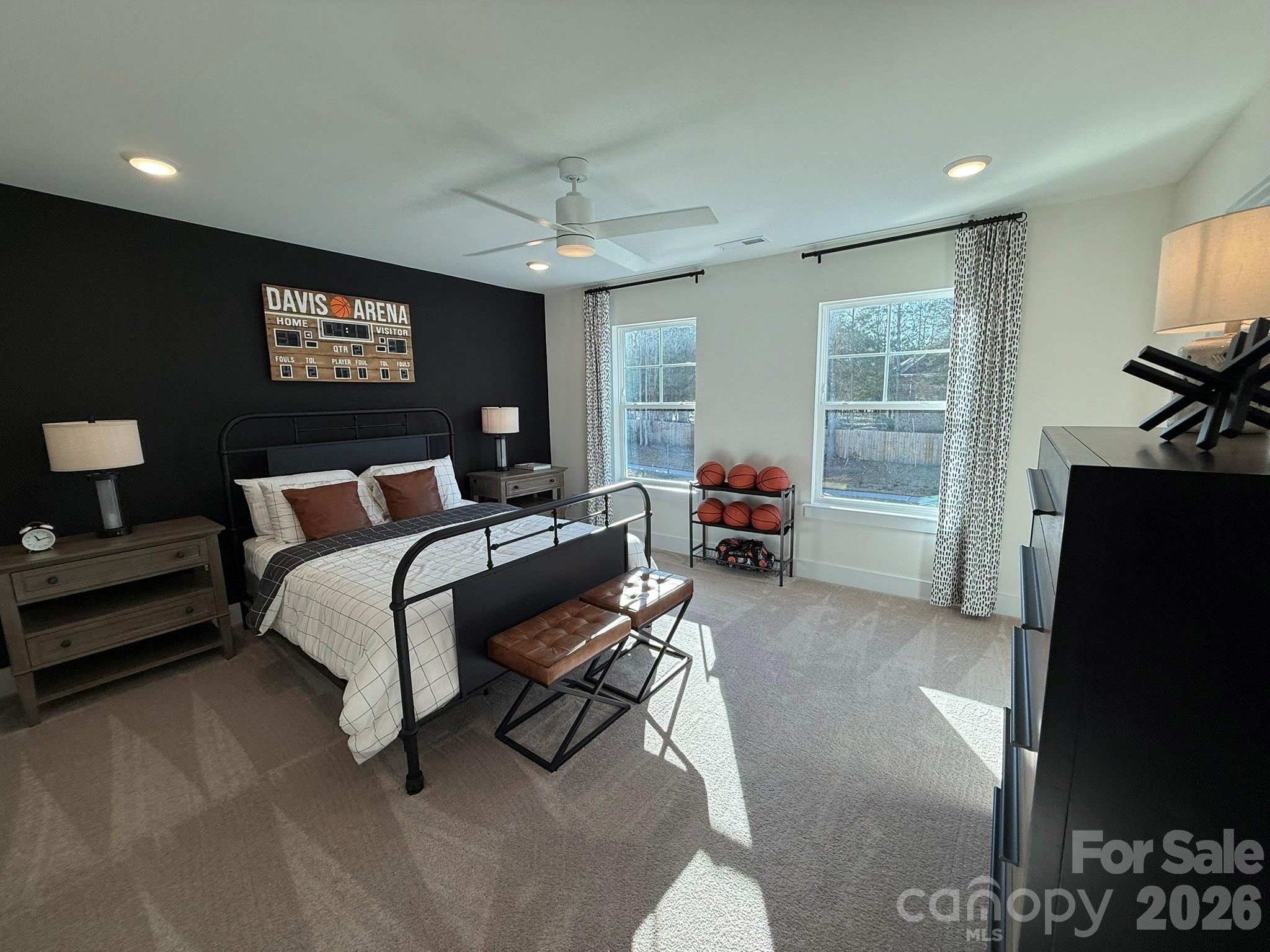 5104 Verona Road Charlotte, NC 28213 - Photo 21 of 28 a bedroom with furniture and a flat screen tv