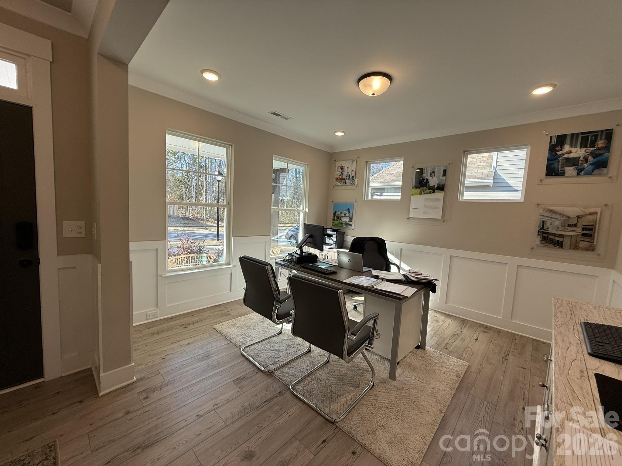 5104 Verona Road Charlotte, NC 28213 - Photo 7 of 28 a view of a workspace with furniture and a window