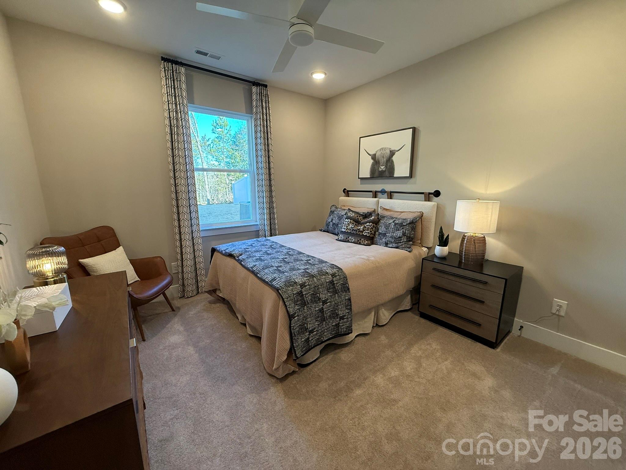 5104 Verona Road Charlotte, NC 28213 - Photo 8 of 28 a bedroom with a bed and wooden floor
