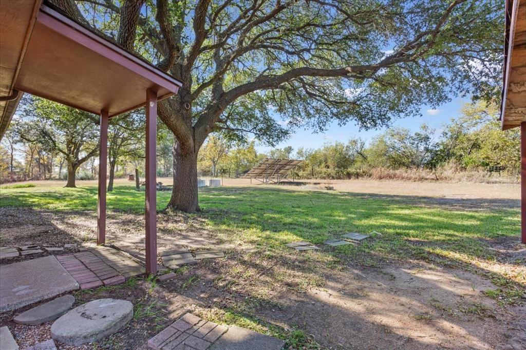 208 South Hedwig Street Riesel, TX 76682 - Photo 28 of 31 View of green lawn