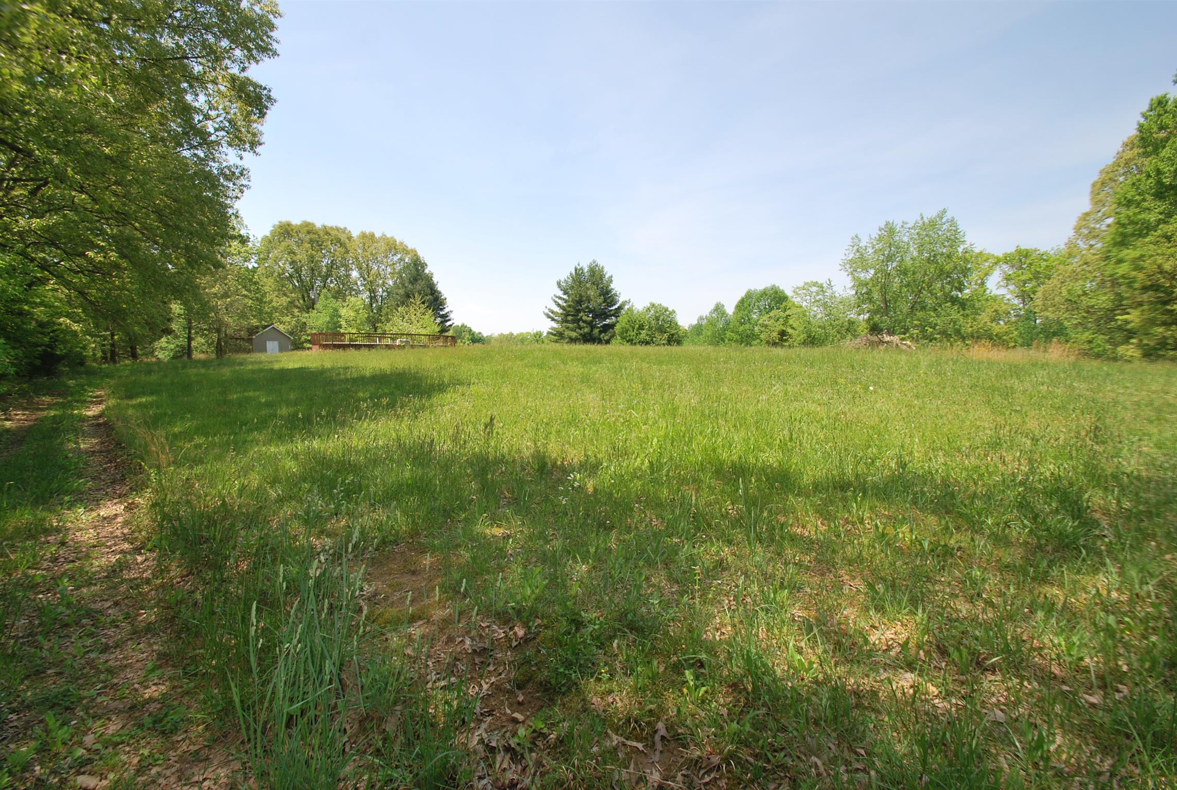 940 North Corinth Road Portland, TN 37148 - Photo 22 of 30 a view of a green field with lots of bushes