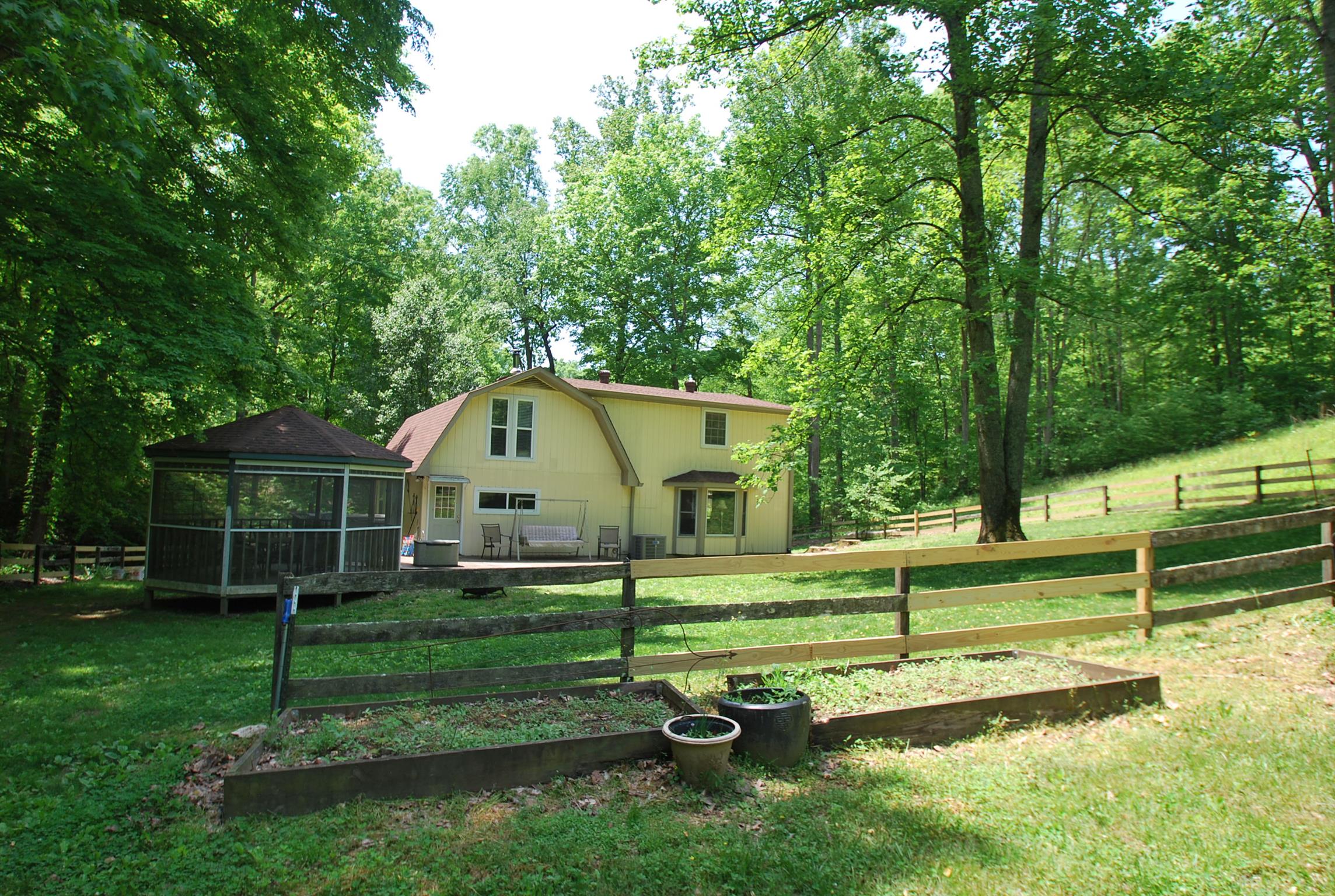 940 North Corinth Road Portland, TN 37148 - Photo 27 of 30 a view of a house with a yard