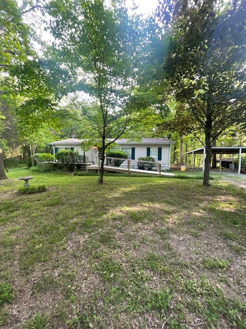 9088 Buck Litton Road Lyles, TN 37098 - Photo 1 of 69 a view of a house with a big yard