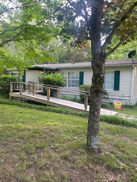 9088 Buck Litton Road Lyles, TN 37098 - Photo 3 of 69 a view of a house with a yard