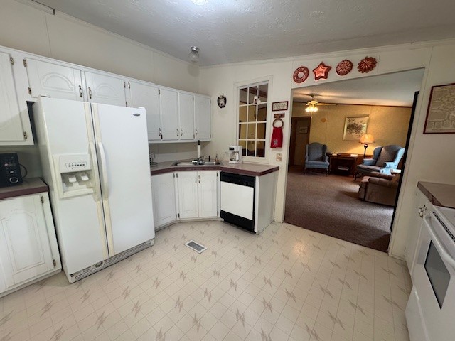 9088 Buck Litton Road Lyles, TN 37098 - Photo 32 of 69 a kitchen with stainless steel appliances a refrigerator and a sink