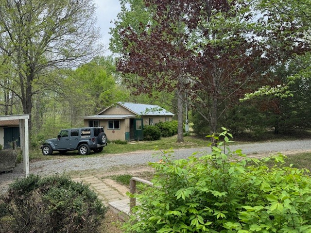 9088 Buck Litton Road Lyles, TN 37098 - Photo 39 of 69 a view of a house with a yard and sitting area