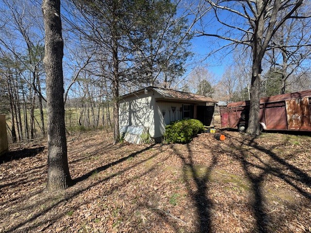 9088 Buck Litton Road Lyles, TN 37098 - Photo 49 of 69 a view of a house with a yard