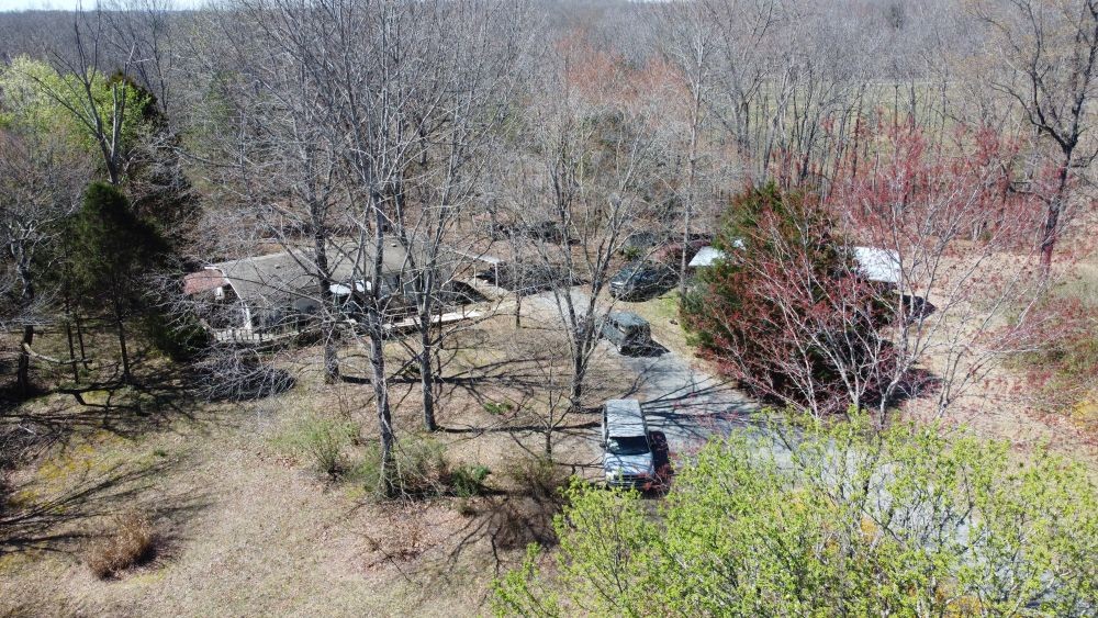 9088 Buck Litton Road Lyles, TN 37098 - Photo 58 of 69 a backyard of a house with lots of green space