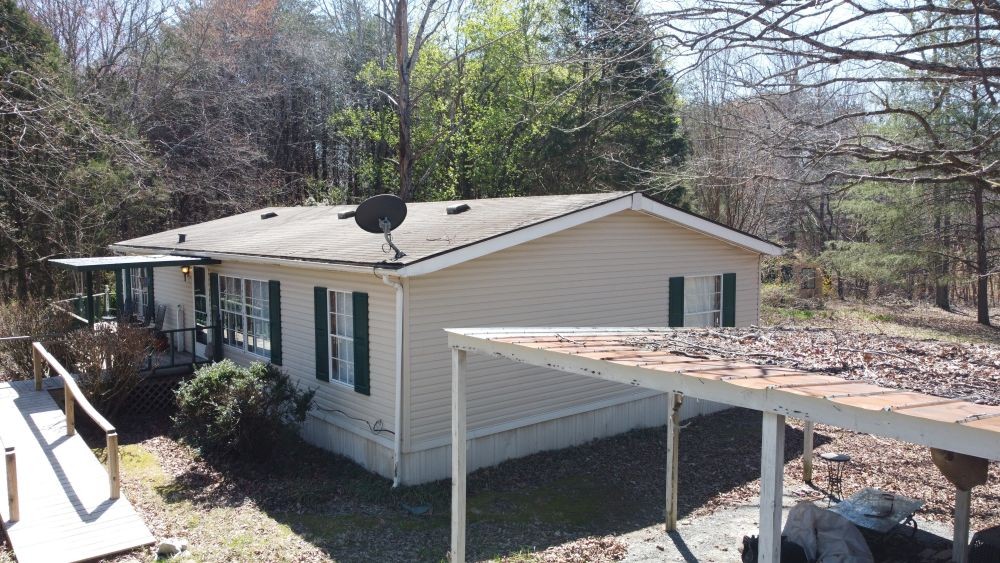 9088 Buck Litton Road Lyles, TN 37098 - Photo 66 of 69 a view of house with a yard and seating space