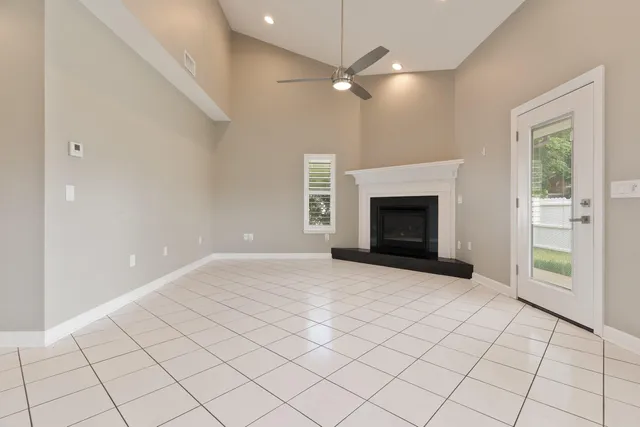 a stove top oven sitting inside of a kitchen