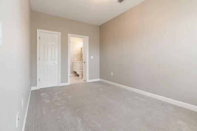 a view of a lake with sitting area