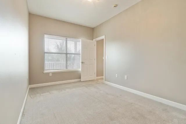 an aerial view of a house with a swimming pool fire pit and outdoor seating