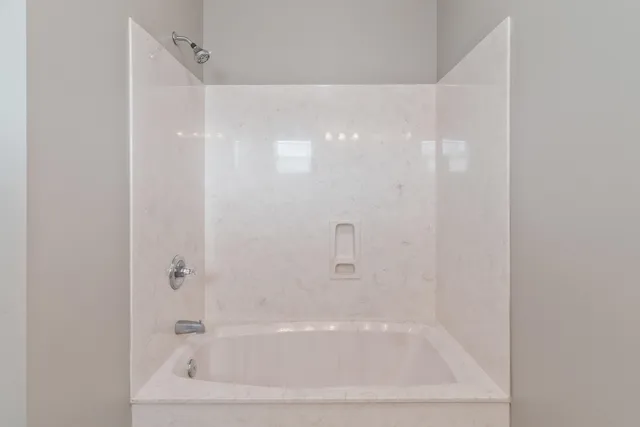 an aerial view of house swimming pool and lake view