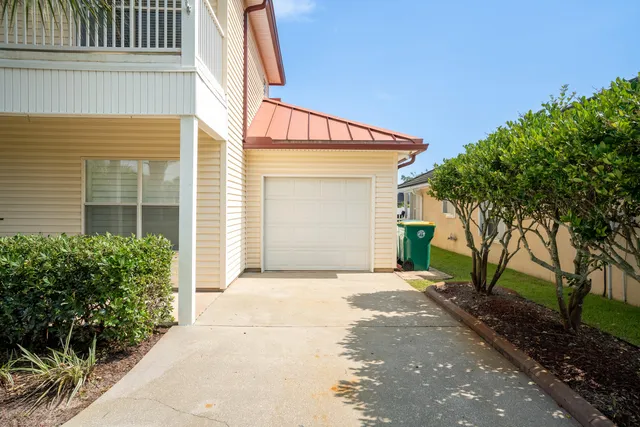 a view of a porch with a small yard