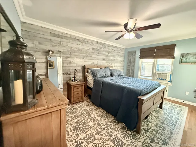 a living room with stainless steel appliances kitchen island granite countertop furniture and a fireplace