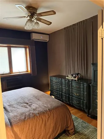 a bedroom with a bed and a closet
