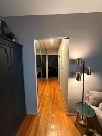 a very nice looking room with wooden floor