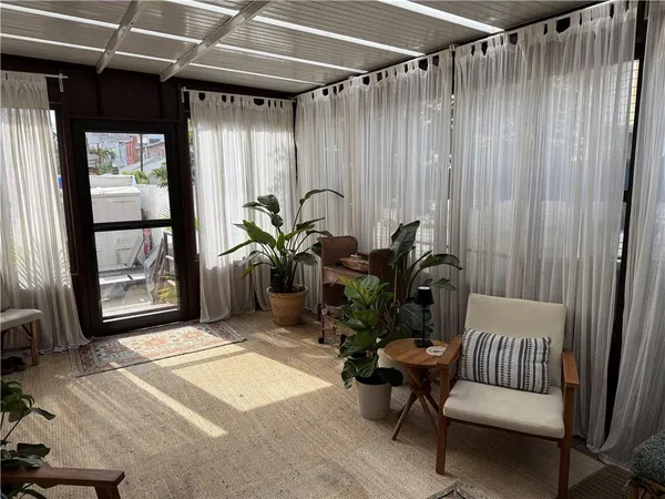 a room with furniture and a window