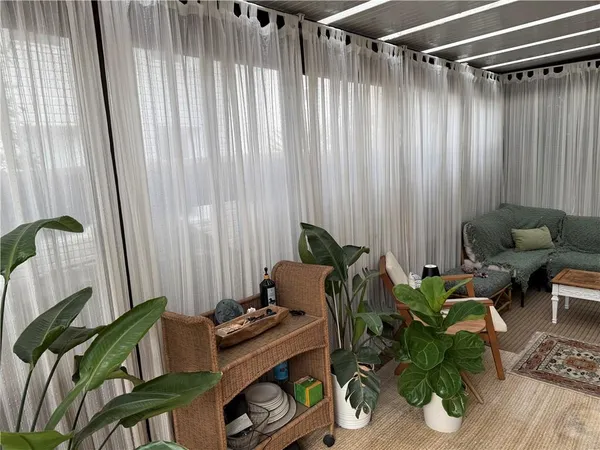 a potted plant sitting in front of a window