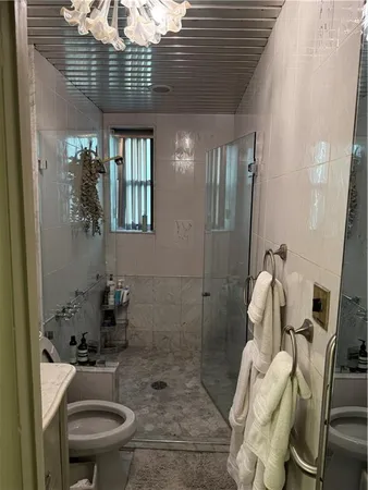 a bathroom with a sink and toilet