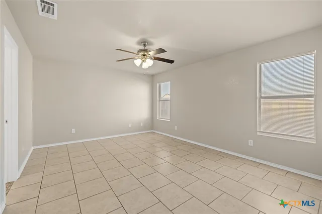a bathroom with a sink a mirror and a vanity